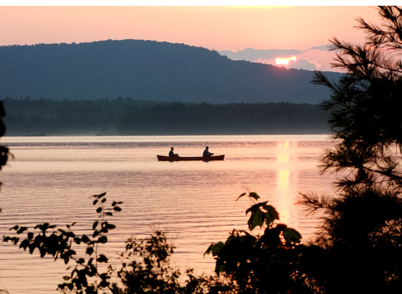 maine lake canoe sunset