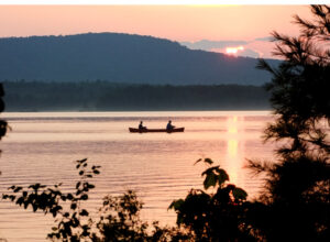 maine lake canoe sunset